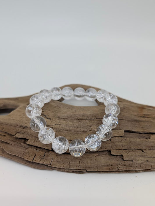 12mm Himalayan clear quartz bracelet with high polish and internal rainbows