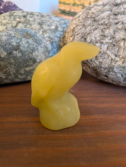tiny-raven-carving-honey-calcite-3cm-translucent-golden-yellow