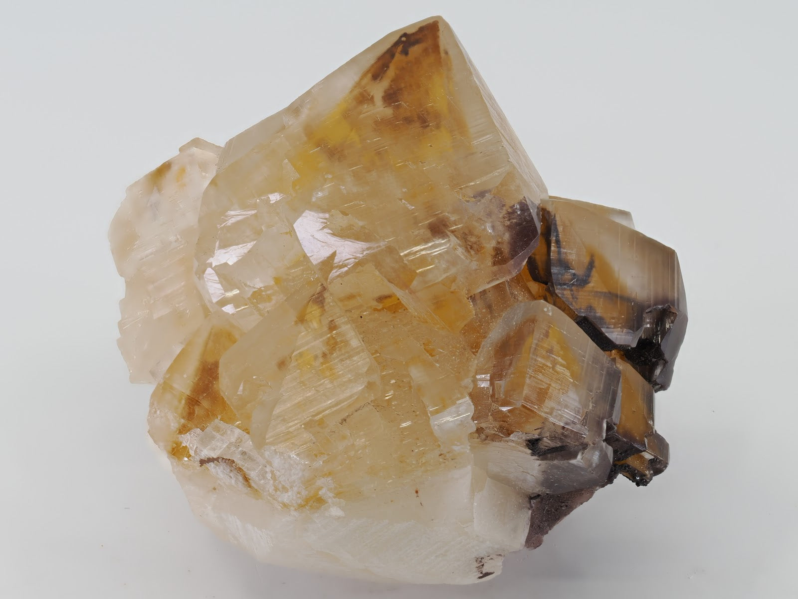 Side profile highlighting the dark "Chocolate" Sphalerite phantoms.