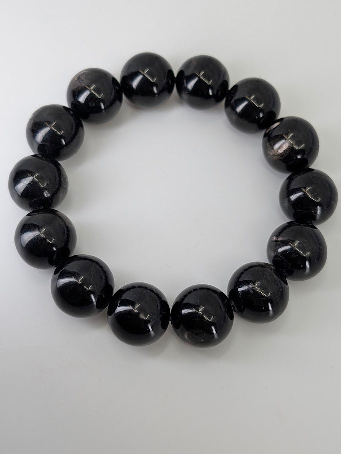 15.5mm Hypersthene bracelet arranged in a circle showing metallic sheen and polished finish