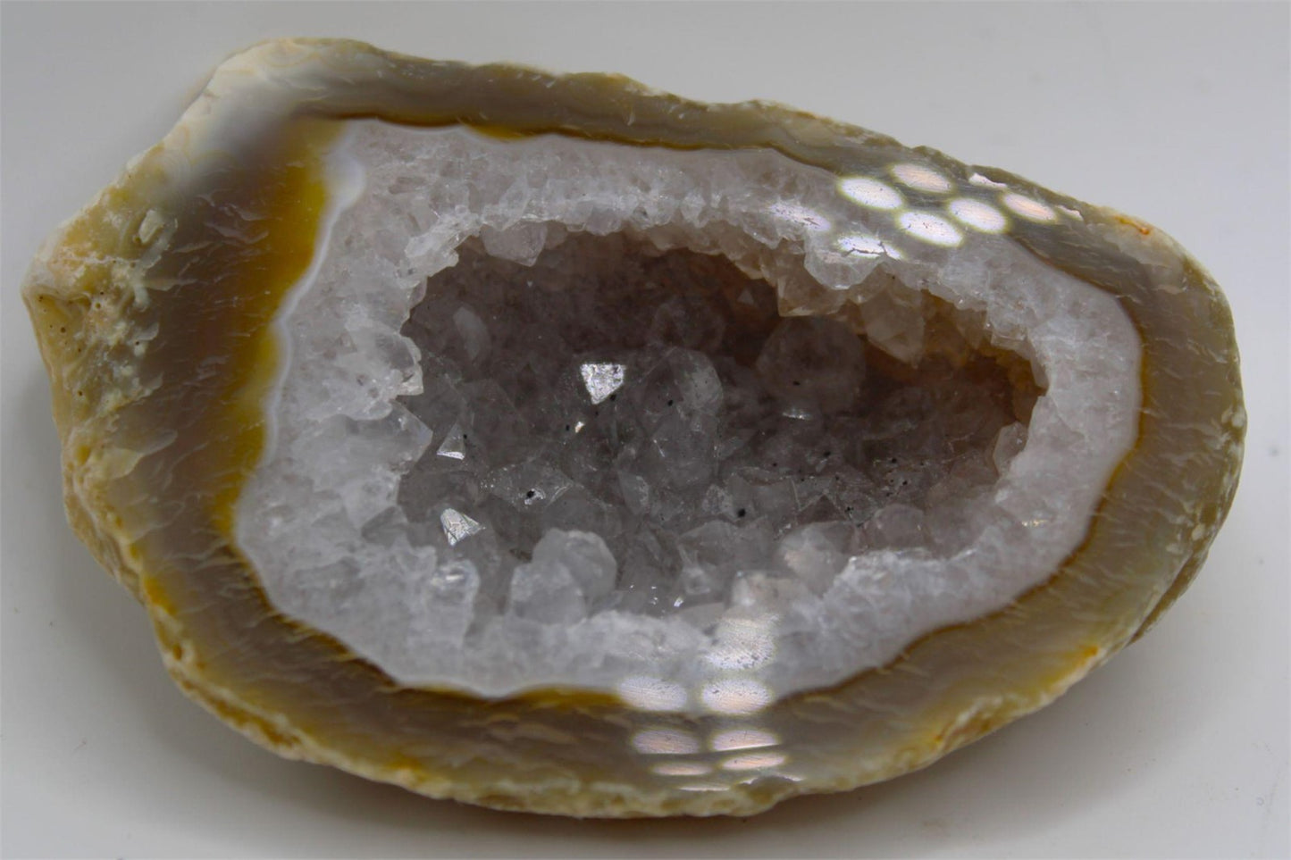 Agate Druzy Geode with large Crystal formations from Brazil. Approx. 8 cm x 5.5 cm