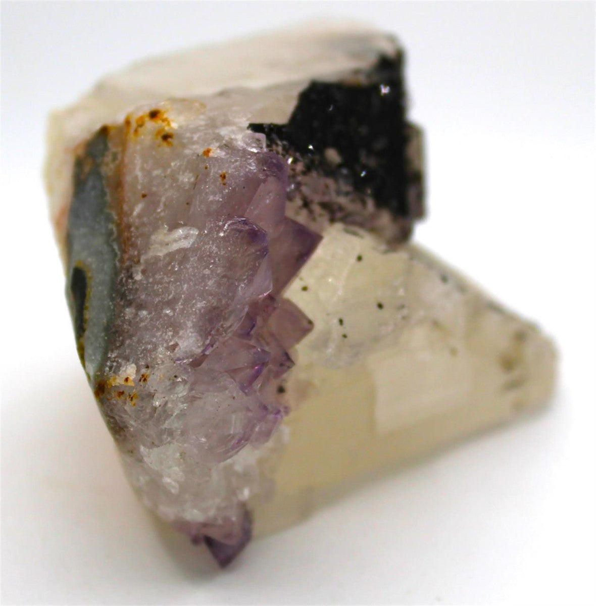 Amethyst with Calcite and Hematite Inclusions – Brazil