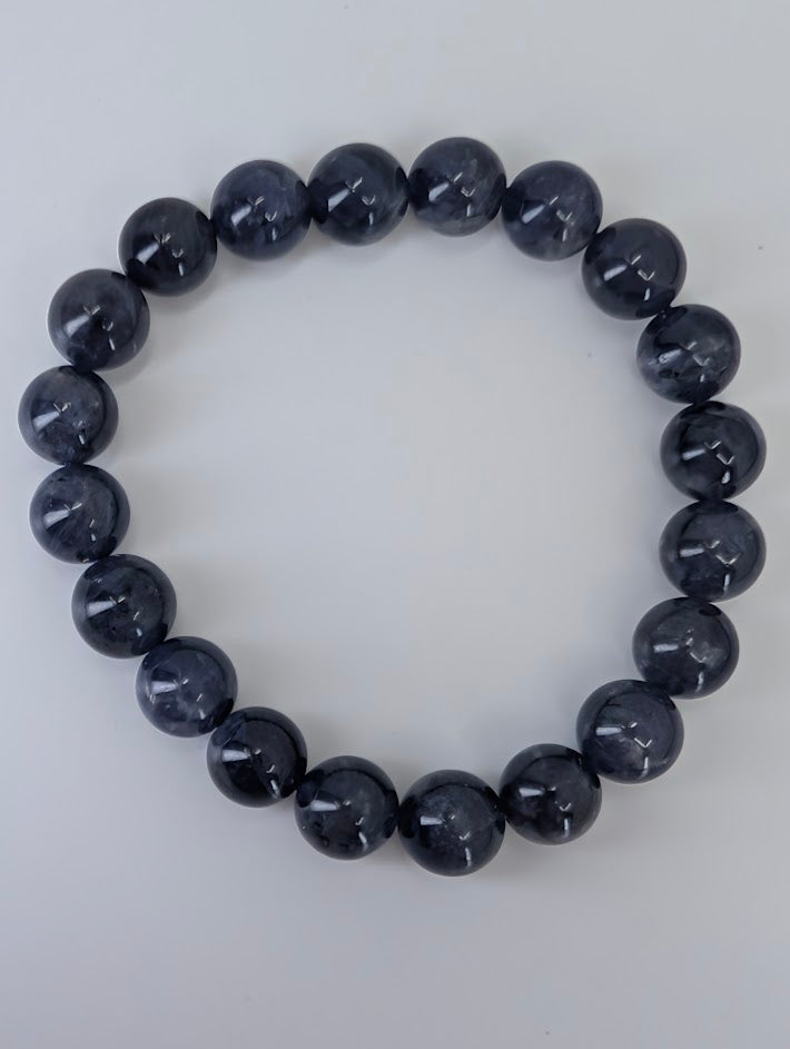 10 mm iolite bracelet with high polish and deep indigo color