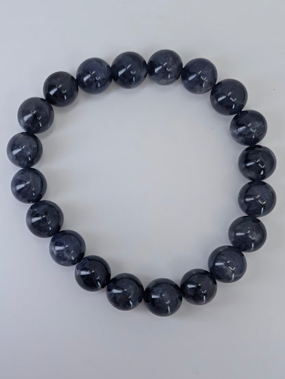 10 mm iolite bracelet with high polish and deep indigo color