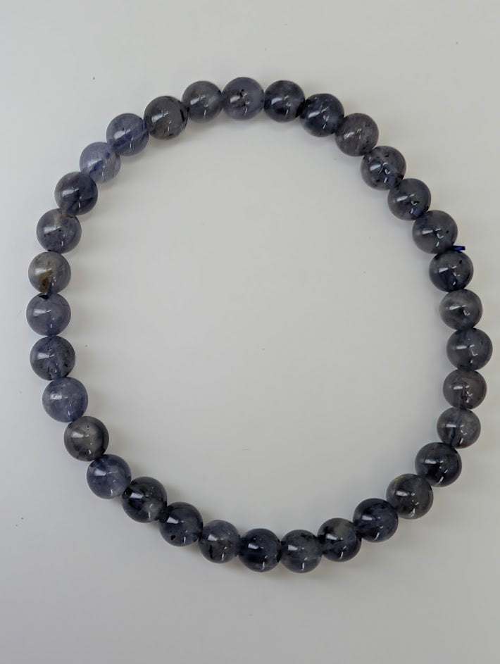 6 mm iolite bracelet with high polish and deep indigo color