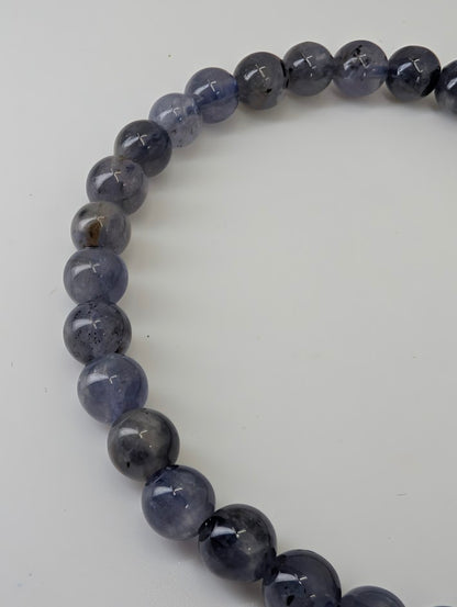 6 mm iolite bracelet showing uniform polish and subtle translucence