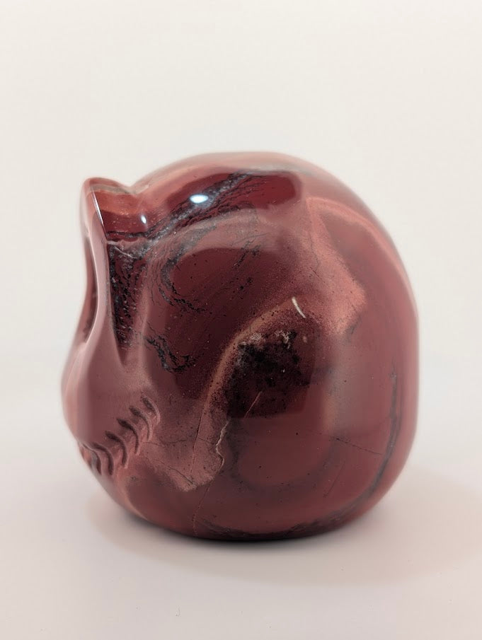 Detail of Red Jasper Jack Skellington carving showing rich red tones and natural veining of side 2