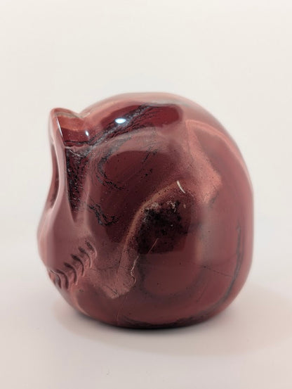 Detail of Red Jasper Jack Skellington carving showing rich red tones and natural veining of side 2