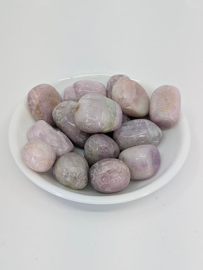 Kunzite tumbled stones A grade in bowl