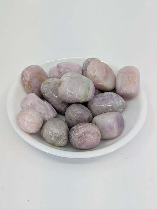 Kunzite tumbled stones A grade in bowl