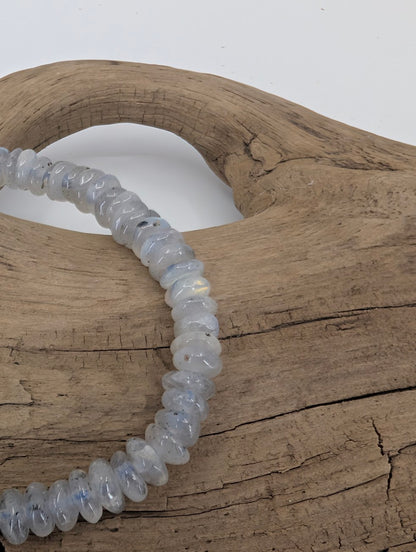 Close-up of labradorite rondelle bracelet showing blue labradorescence