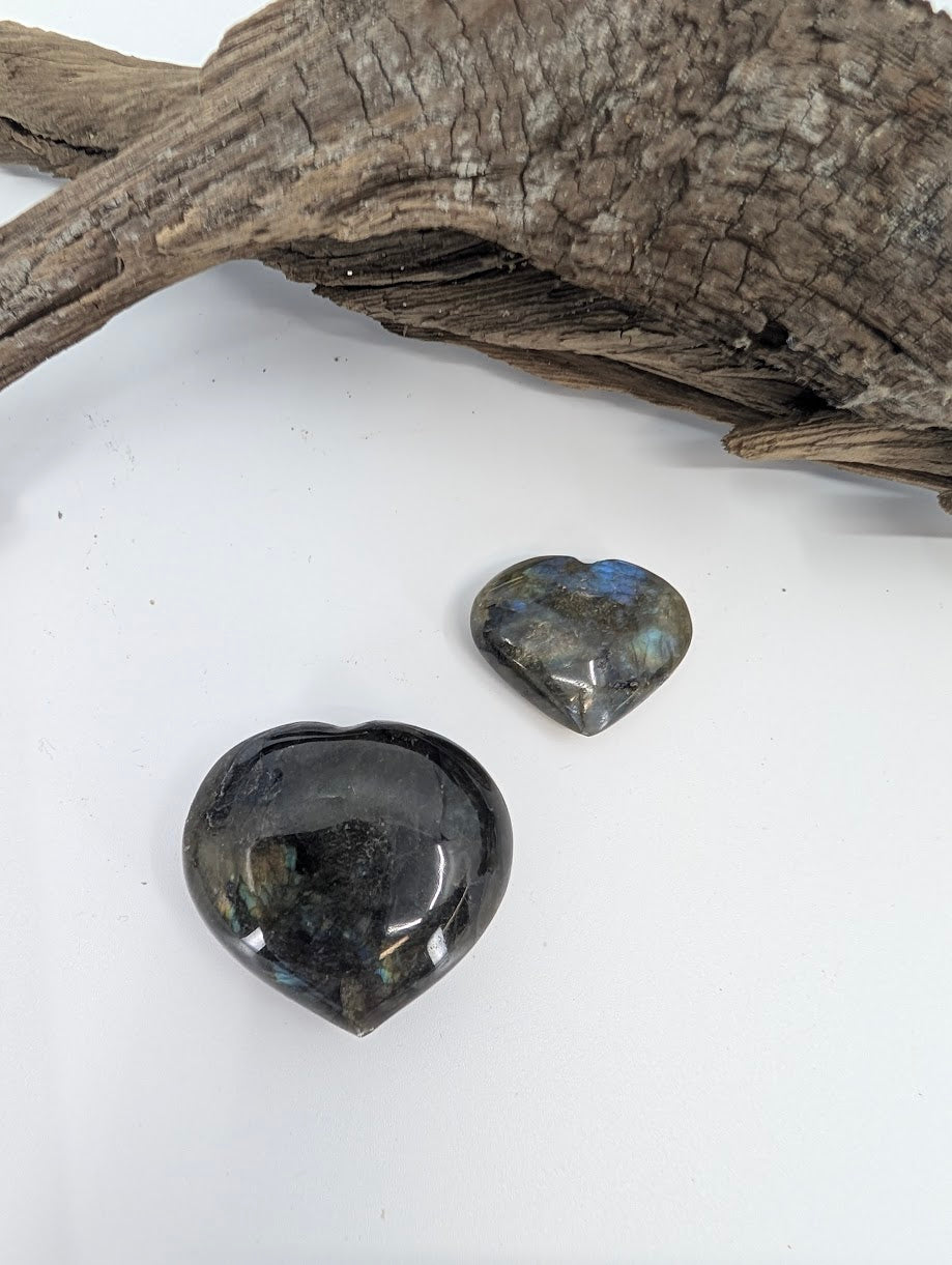 Pair of Labradorite hearts showing blue flash in Small and Medium sizes.
