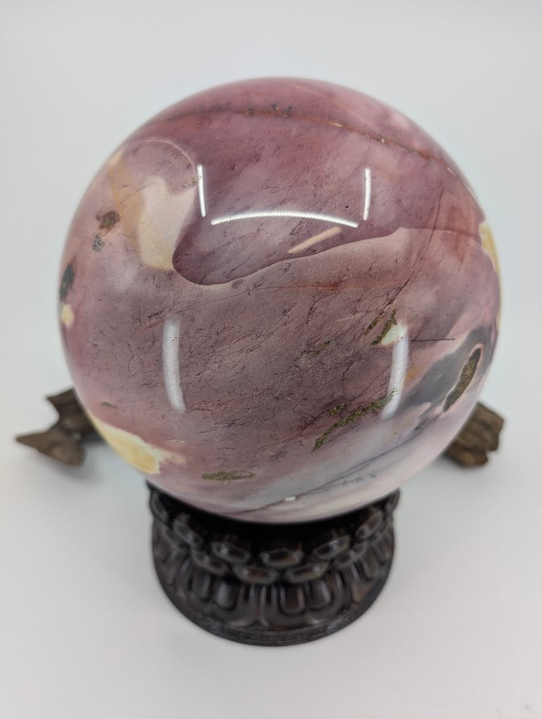High-gloss polished purple side of a 9.56kg Mookaite sphere from Western Australia.