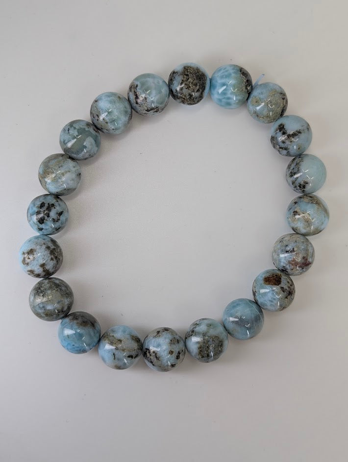 9 mm Larimar bracelet laid flat with visible matrix pattern