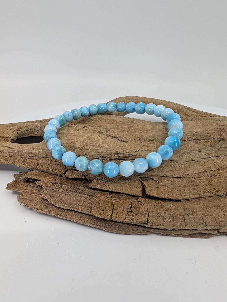 Natural Larimar bracelet 6mm AA grade with soft blue marbling
