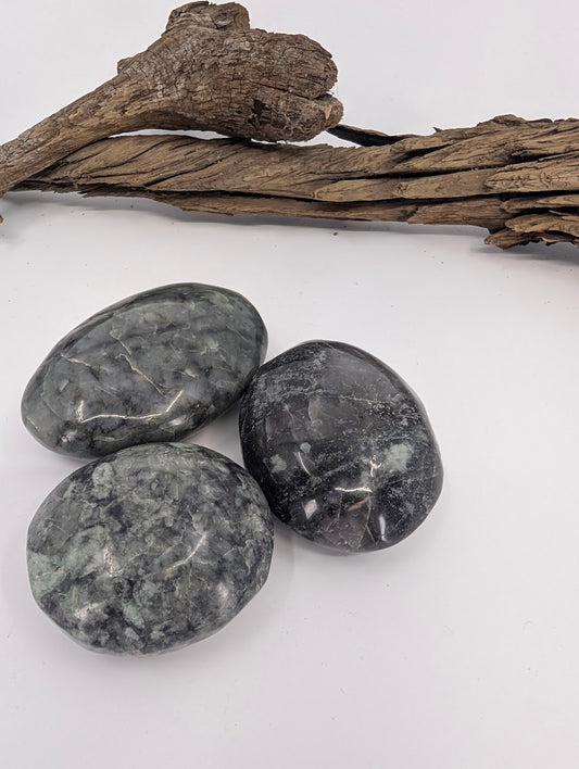 Large larvikite palm stones polished smoky grey group photo