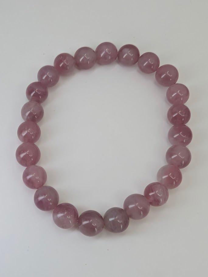 Lavender Rose Quartz 8mm round beads with uniform polish and soft translucency
