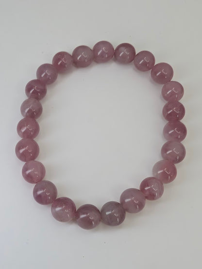 Lavender Rose Quartz 8mm round beads with uniform polish and soft translucency
