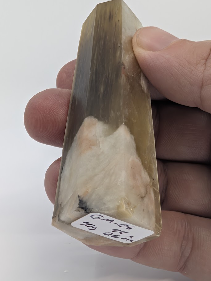 Close-up of quartz–calcite matrix base showing natural contact and stability