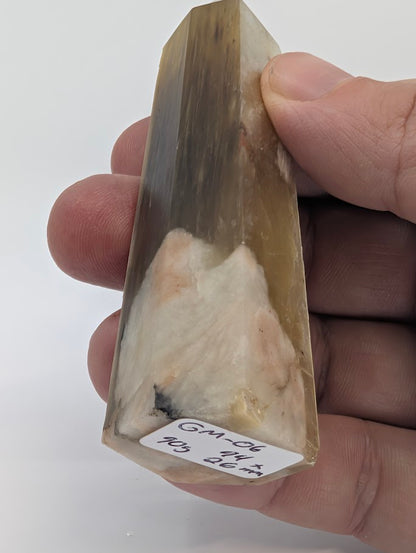 Close-up of quartz–calcite matrix base showing natural contact and stability