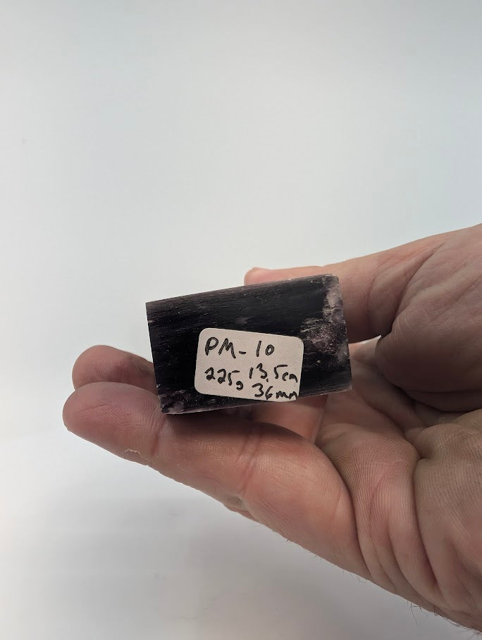 Base view with PM-10 label and specimen details 225 g 13.5 cm from Minas Gerais Brazil