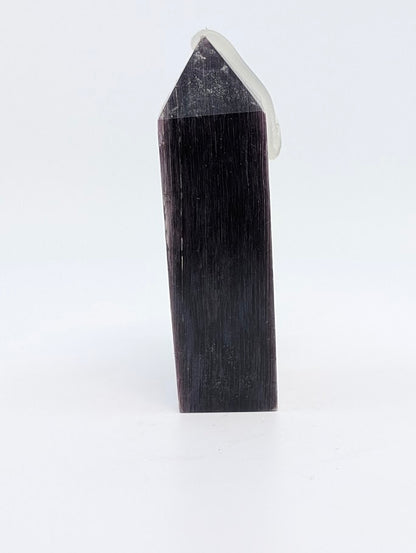 Right-side view of polished Lepidolite tower from Minas Gerais with smooth reflective mica texture