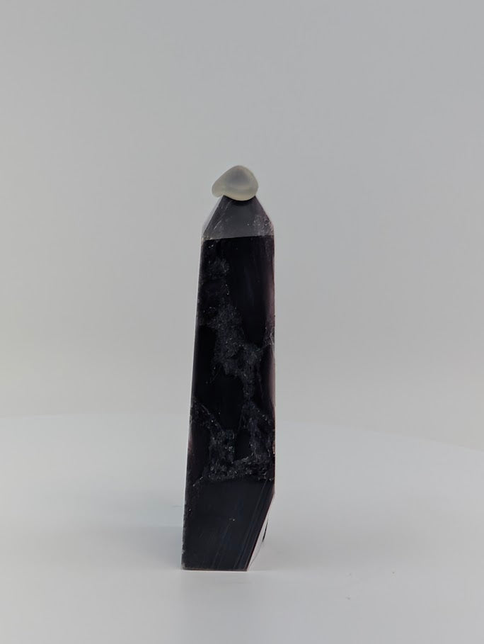 Side profile of Lepidolite tower showing vertical mica veins and layered structure