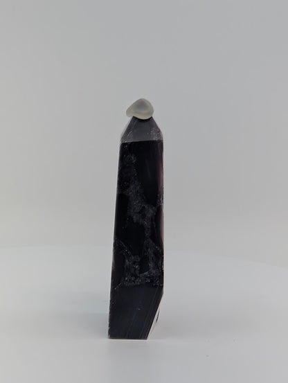 Side profile of Lepidolite tower showing vertical mica veins and layered structure