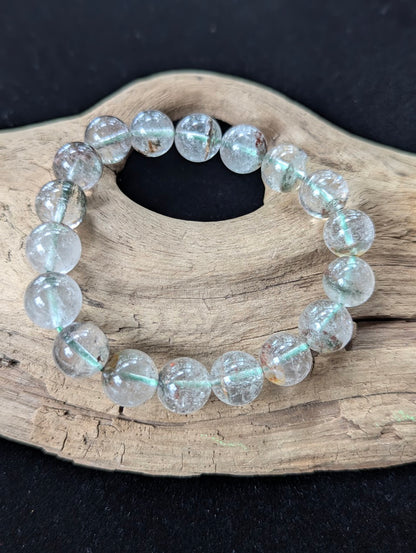 11mm Light Garden Quartz (Lodolite) Bracelet, showcasing large clear beads with distinct mineral landscapes.