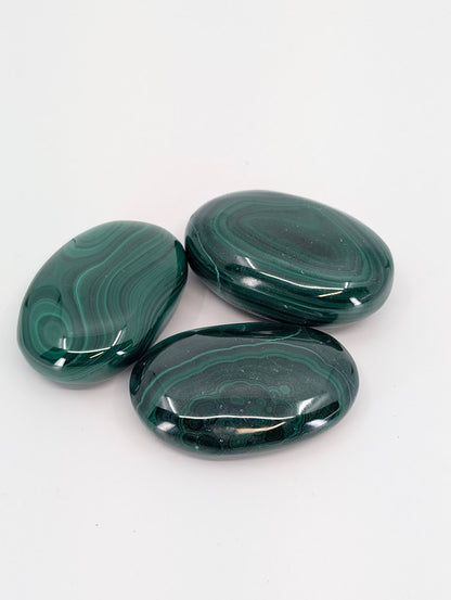 Malachite Palm Stones showing vivid green banding and polish