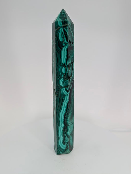 Malachite tower – full view showing deep banding