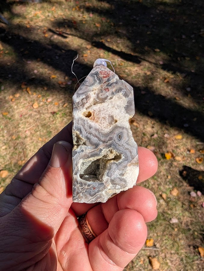 Mexican Lace Agate Tower #2 back view — polished agate showing grey and red lace patterns