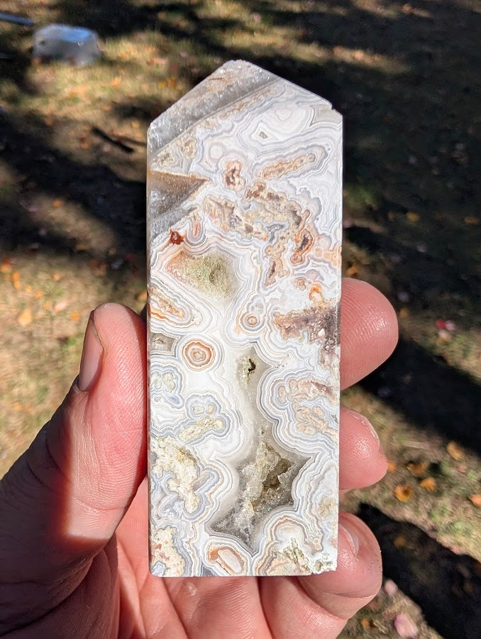 Mexican Lace Agate Tower #4 back view — intricate lace patterns with open quartz cavity