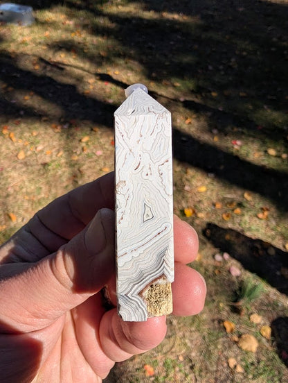 Mexican Lace Agate Tower #5 angled view — compact tower with sparkling druzy cavities