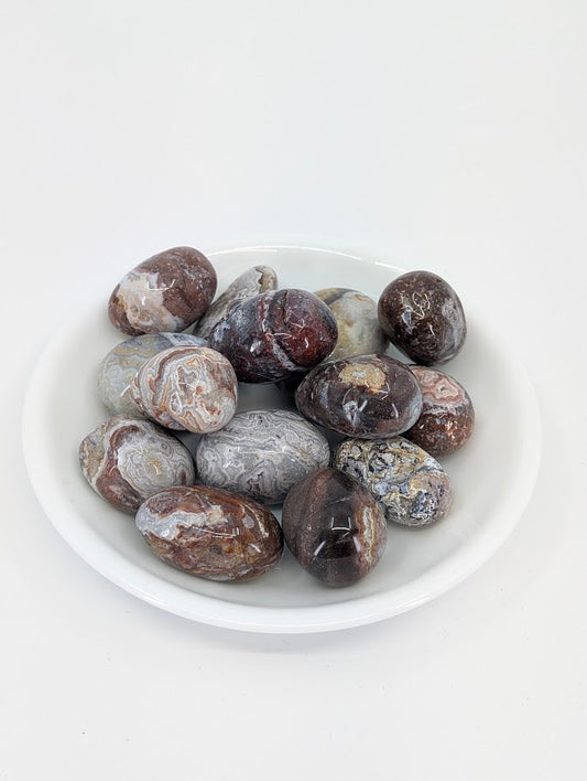 Mexican Lace Agate tumbled stones A grade in bowl