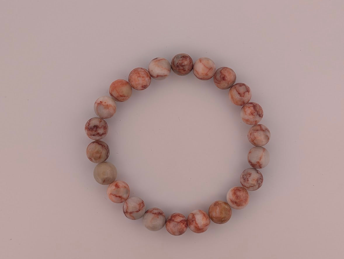 Top-down view of Red Vein Jasper 8mm stretch bracelet