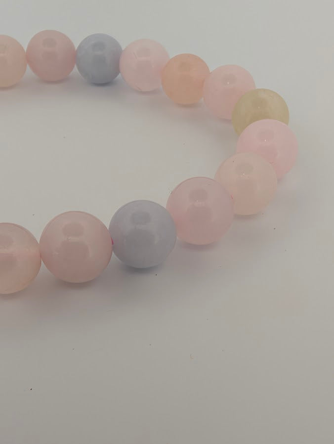 Close-up of morganite 8MM beads with luminous pastel color