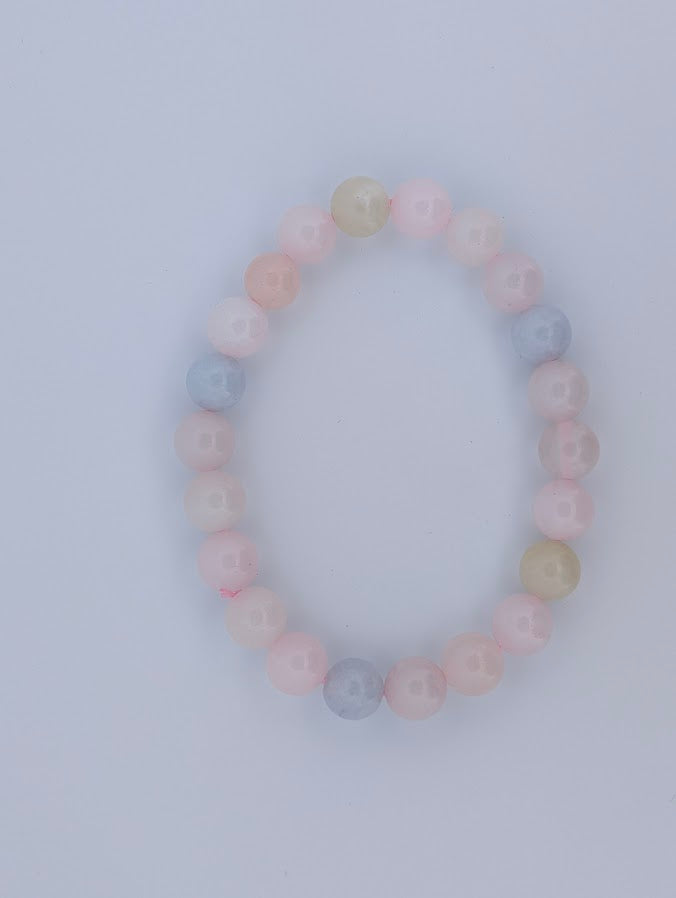 Top view of 8MM morganite round bead bracelet on stretch cord