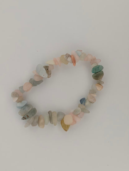 Top view of morganite chip bracelet with soft watery translucence