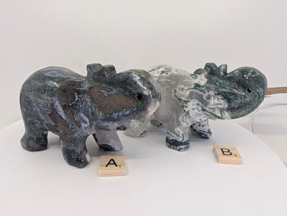 Two hand-carved Indian Moss Agate elephants A and B showing green dendritic patterns.