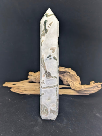 Angled view of MA-01 Moss Agate tower highlighting the contrast between green dendrites and white matrix.