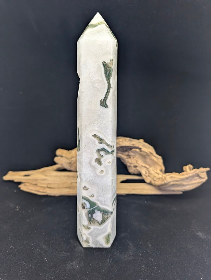 Side profile of Moss Agate tower MA-01 showcasing vertical mineral plume distribution.
