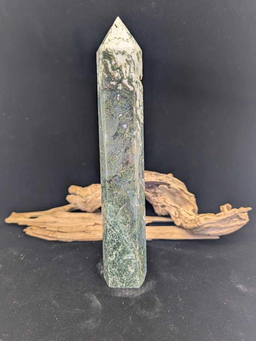 Exact-piece MA-02 Moss Agate tower featuring a minimalist landscape style with sparse green plumes.
