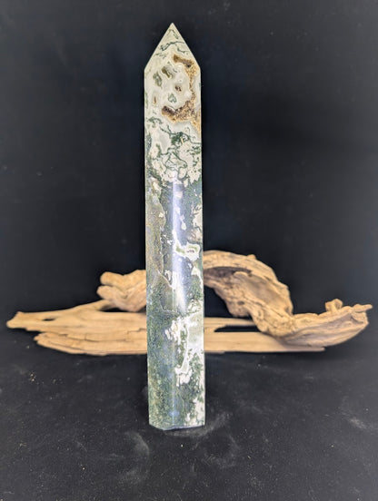 Detailed view of the terminated point on Moss Agate tower MA-02 showing mineral clarity.