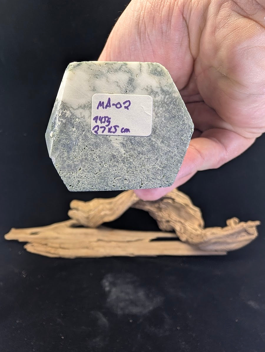 Base of Moss Agate tower MA-02 showing weight in grams and hexagonal polished form.