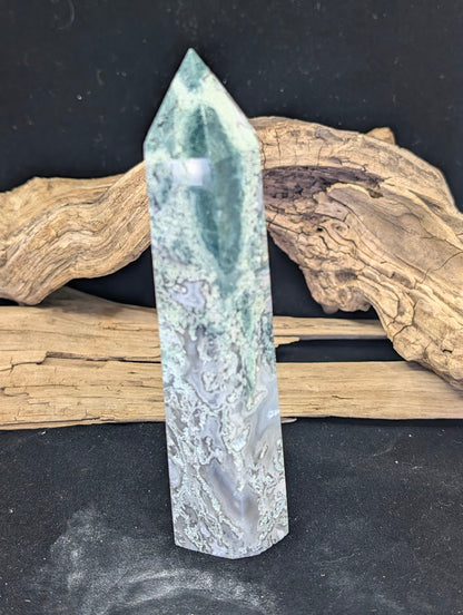 Backlit view of tower MA-04 highlighting the stone's translucency and depth.