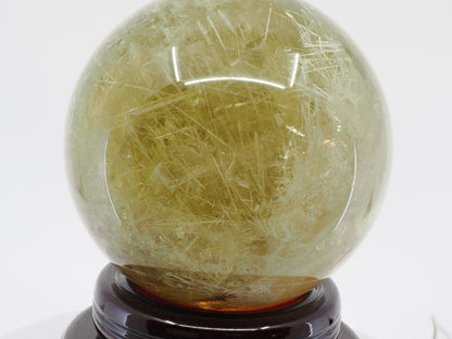 Reverse view of large 6.5 inch natural citrine sphere showing consistent inclusion density.