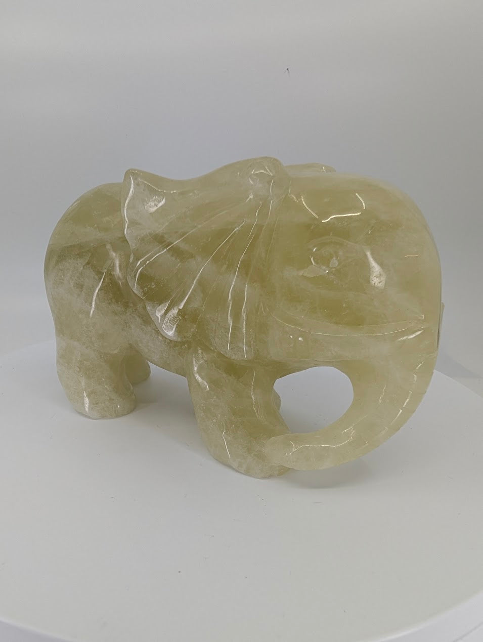 Natural Lemon Citrine elephant carving from Brazil, 1.32 kg, front view