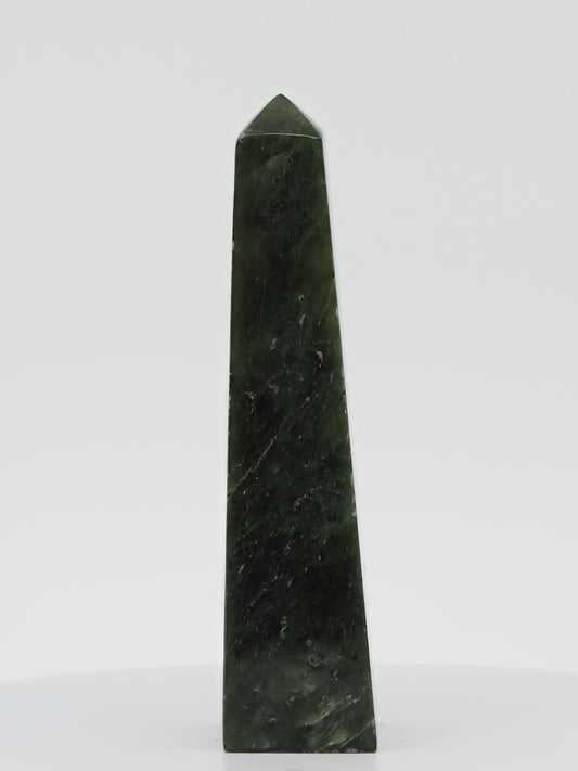 Polished Nephrite Jade tower from Pakistan featuring a deep dark spinach green color and silky waxy luster.