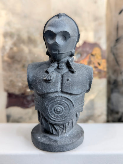 Front view of matte obsidian C-3PO droid bust carving.